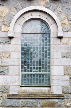 An old church window showing much detail and texture