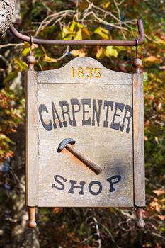 A carpenter shop sign at the carpenter shop in Allaire Village, New Jersey. Allaire village was a bog iron industry town in New Jersey during the early 19th century. 