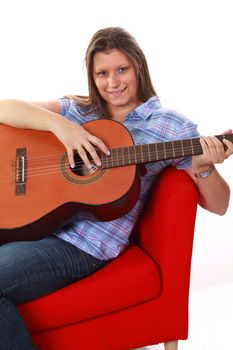 beautiful girl playing guitar 