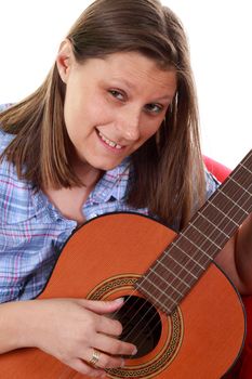 beautiful girl playing guitar 