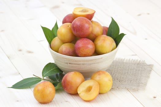 Fresh plums in the bowl