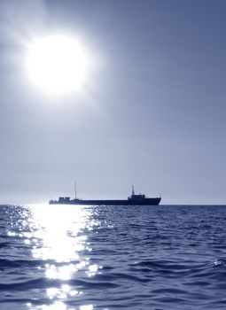 Transport by boat - transport boat at the horizont