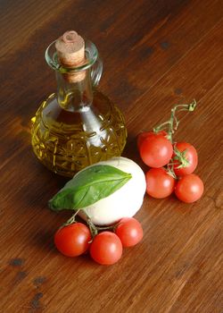 mozzarella with tomatoes, oil and basil 