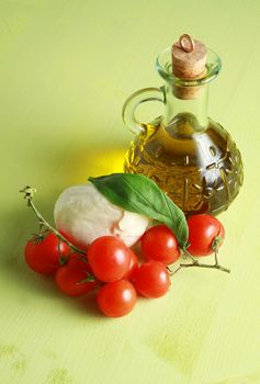 mozzarella with tomatoes, oil and basil 