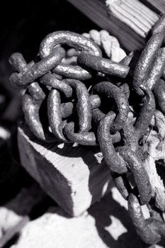 Old rusty metal chain close up , shallow DOF photo