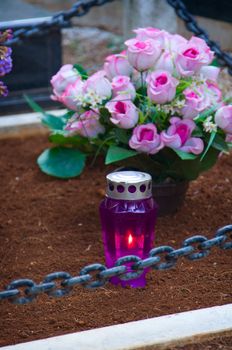 European catholic graveyard with  flowers