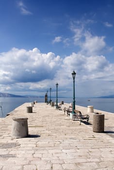 Stone pier in a small Mediterranean town