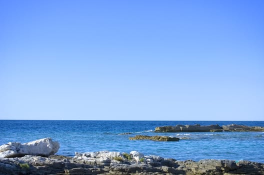 Beautiful rocky beach on a sunny summer day