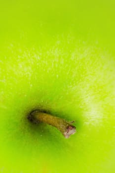 Delicious green apple close up photo with shallow DOF with lots of space for your text