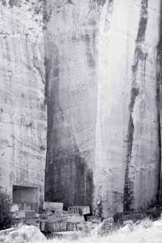 Old abandoned stone quarry - black and white toned photo