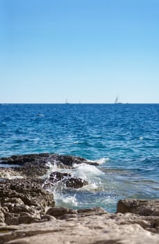 Rocky Mediterranean beach on a sunny summer day