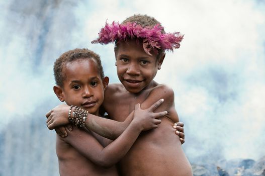 Children of a new Guinean tribe of natives Dani Dugum.