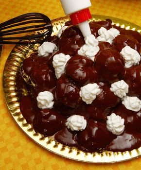 profiterole, classic italian dessert with chocolate 