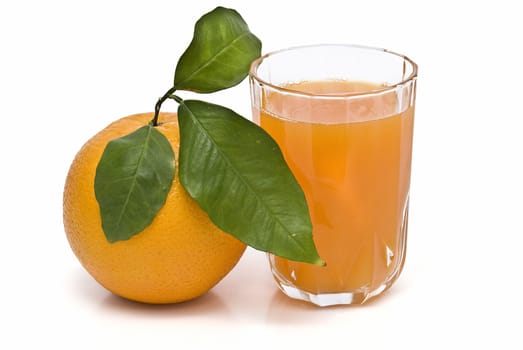 Spanish oranges from Valencia with leaves and its juice isolated on a white background.