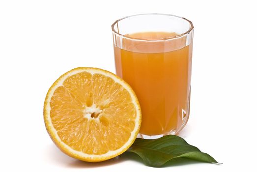 Spanish oranges from Valencia with leaves and its juice isolated on a white background.