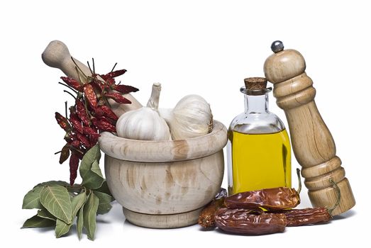 Mediterranean spices and olive oil isolated on a white background.