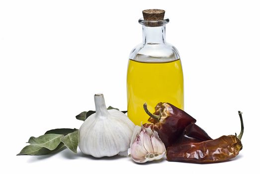 Mediterranean spices and olive oil isolated on a white background.