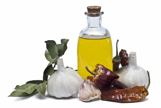 Mediterranean spices and olive oil isolated on a white background.