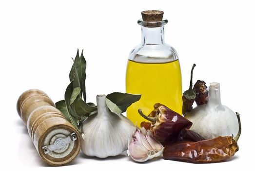 Mediterranean spices and olive oil isolated on a white background.