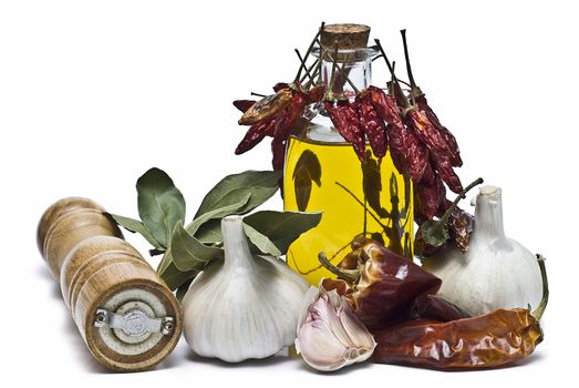 Mediterranean spices and olive oil isolated on a white background.