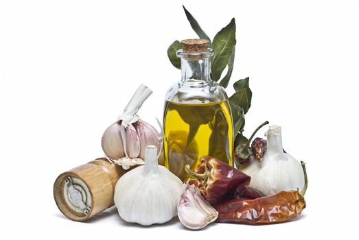 Mediterranean spices and olive oil isolated on a white background.