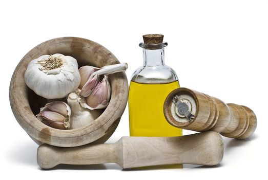 Mediterranean spices and olive oil isolated on a white background.