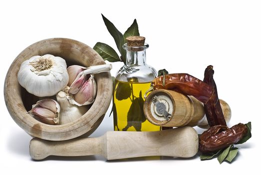 Mediterranean spices and olive oil isolated on a white background.