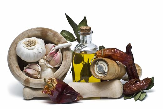 Mediterranean spices and olive oil isolated on a white background.