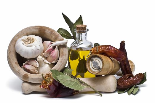 Mediterranean spices and olive oil isolated on a white background.