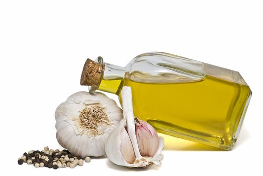 Mediterranean spices and olive oil isolated on a white background.