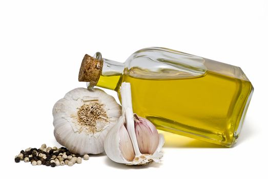 Mediterranean spices and olive oil isolated on a white background.