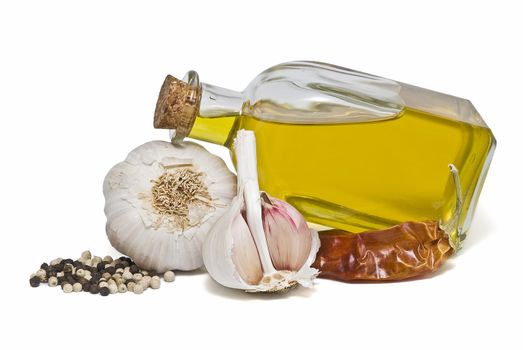 Mediterranean spices and olive oil isolated on a white background.