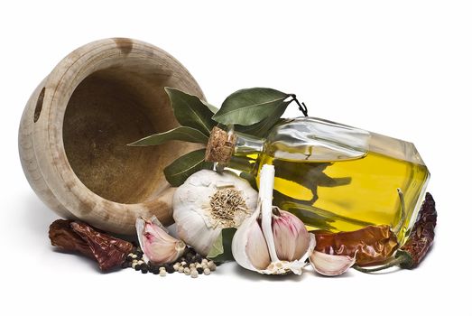 Mediterranean spices and olive oil isolated on a white background.