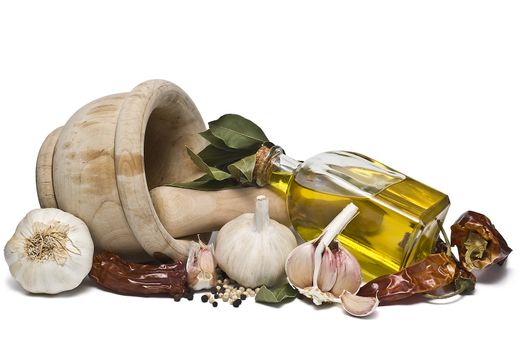 Mediterranean spices and olive oil isolated on a white background.