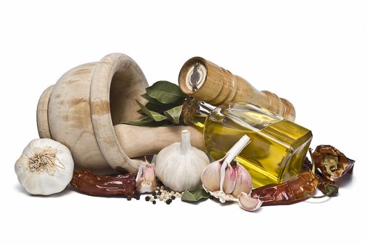 Mediterranean spices and olive oil isolated on a white background.