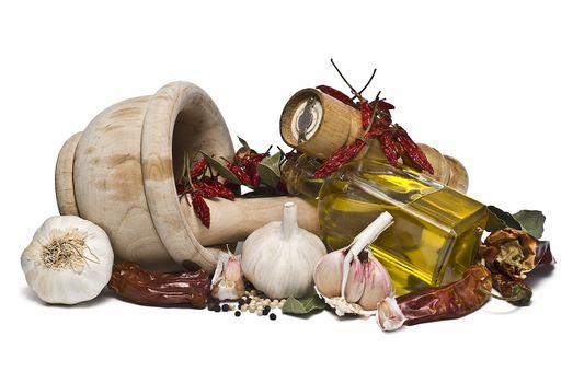 Mediterranean spices and olive oil isolated on a white background.