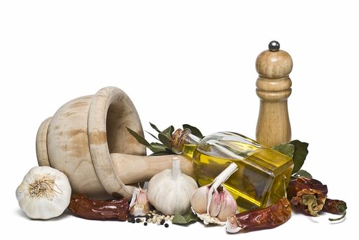 Mediterranean spices and olive oil isolated on a white background.