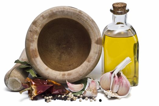 Mediterranean spices and olive oil isolated on a white background.