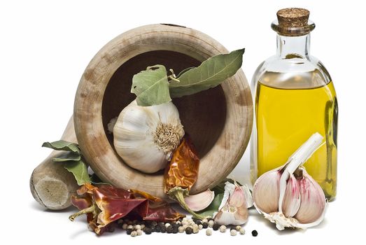 Mediterranean spices and olive oil isolated on a white background.