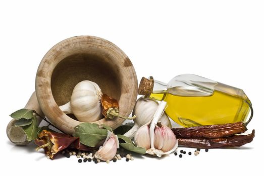 Mediterranean spices and olive oil isolated on a white background.