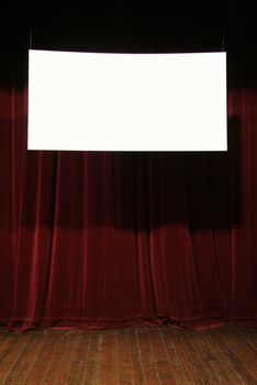 empty white sign, velvet curtain in background, wooden stage