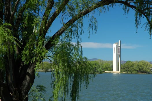 famous white Carillion in Canberra, trees in foreground