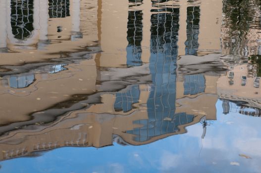Mirror in the water of the bulding in moscow