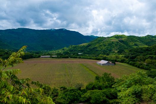 House on the plain between mountains of Nicaragua