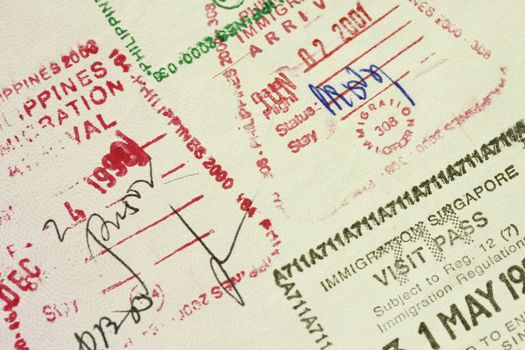 Passport stamps with cancel visa stamp on Philippine passport.