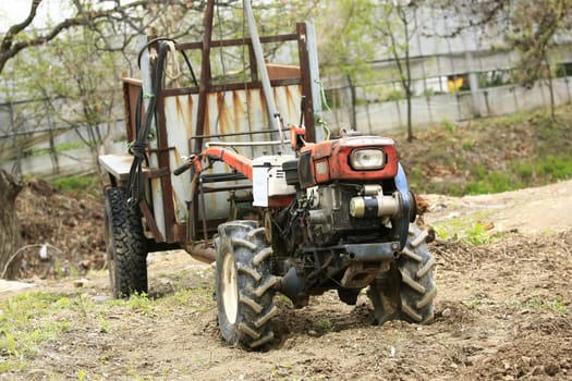 old hand tractor park in a farm in korea