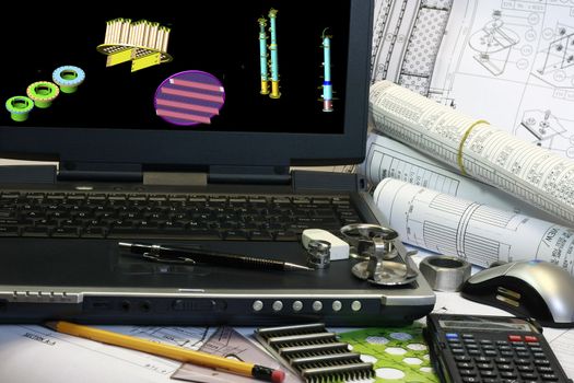 Drafting of mechanical 3d parts. Note disiplay in the monitor is my original works.