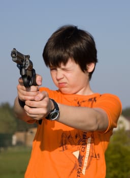Boy with gun
