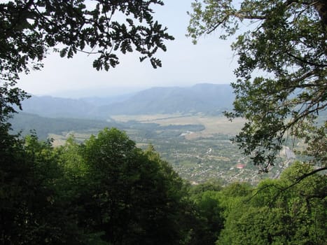 Mountains, rocks; a relief; a landscape; a hill; a panorama; Caucasus; top; a slope; a snow, a cool, clouds