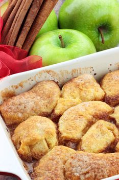 Apple dumplings. Apples wrapped in cresent roll dough and baked in butter, cinnamon, sugar and citrus pop. 